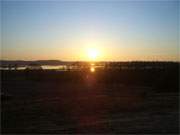 Nepperminer See: Sonnenuntergang ber einem Arm des Achterwassers.