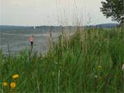 Badespa auf Usedom: Trotz bewlktem Himmel ldt das Achterwasser zum Baden ein.