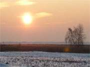 Sonnenuntergang ber dem weiten Wiesenland zwischen Loddin und Koserow.