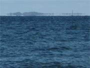 "Schwebende Insel": Ganz in der Ferne scheint die Greifswalder Oie ber dem Wasser zu schweben.