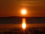 Bernsteinbad Loddin: Sonnenuntergang ber dem Achterwasser.