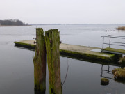 Eis auf dem Usedomer See: Hafen der Stadt Usedom.