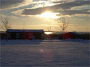 Abendrot ber dem Achterwasserhafen des Bernsteinbades Loddin: Usedomer Winter-Romantik.