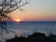 Ausblick vom Loddiner Hft: Sonnenuntergang ber dem Achterwasser.