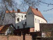 Wolgast — Stadt am Peenestrom: Huser an der mittelalterlichen Stadtmauer.
