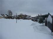 Eingeschneit: Der Achterwasserhafen des "Wintersportortes" Loddin im tiefen Schnee.