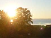 Sonnenuntergang ber der Insel Usedom: Blick auf das Achterwasser.