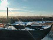 Fischerboot auf Eis: Der Winter hlt Einzug auf der Insel Usedom.