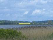 Wolken ber dem Strom: Deichwanderung auf dem Lieper Winkel der Insel Usedom.