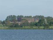 Der Norden der Insel Usedom: Die Ruine des Sauerstoffwerkes von Peenemnde vom Peenestrom aus gesehen.