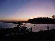 Sonnenuntergang ber der Insel Usedom: Achterwasser und Hftberg.