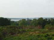 Benzer Kirche und Schmollensee: Blick vom Mhlenberg bei Benz.