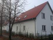 Blick von der Strandstrae: Ferienwohnungen Alter Schulgarten.