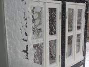 Leidlich freie Fenster: Veranda im Schneesturm.