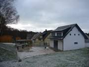 Erster Schnee: Ferienhuser im Ostseebad Koserow.