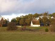 Blick auf das Achterwasser: Fischerdorf Loddin in der Inselmitte.