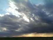 Kurz vor Sonnenuntergang: Wolken ber dem Achterwasser.