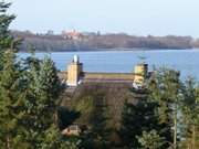 Blick ber den Schmollensee: Schloss Pudagla im Hintergrund.