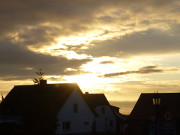 Sonnenuntergang ber dem Achterwasser: Fischerdorf Loddin.