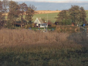 Hinterland der Insel Usedom: Bootshuser am Nepperminer See.