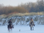 Zwischen ckeritz und Bansin: Reiter auf dem Winterstrand.