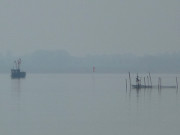 An der Usedomer Halbinsel Gnitz: Fischerboot und Stellnetz.