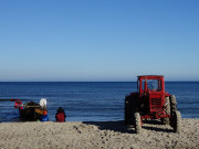 Rckkehr vom Fischfang: Ostseestrand von Klpinsee.