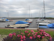 Wolken ber dem Achterwasserhafen des Seebades ckeritz.