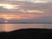 Boot auf dem Achterwasser: Sonnenuntergang bei Loddin.