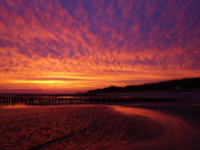 Ein Fest der Farben: Die Sonne geht am Strand von Klpinsee auf.