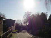 Das in der Sonne glitzernde Stettiner Haff: Bergstrae in Kamminke.